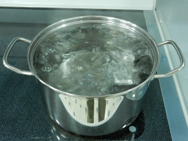 Can in boiling water