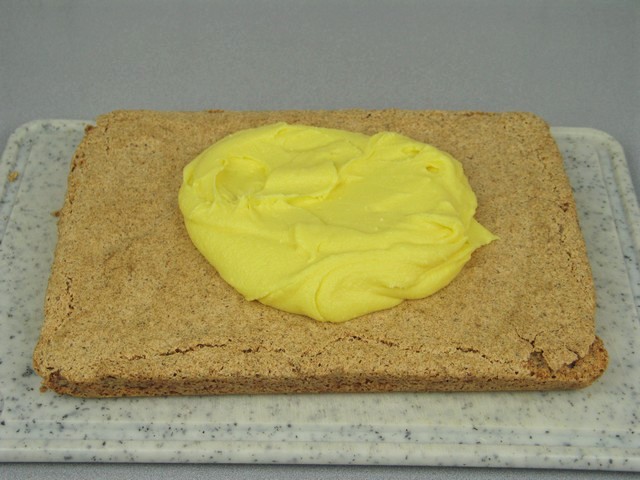 http://thecountrybasket.com/wp-content/uploads/2012/03/Yellow-frosting-almond-ikea-cake.jpg