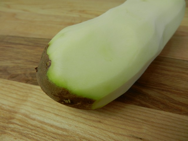 Potato with green areas