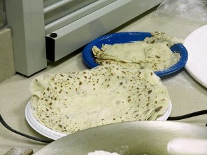 Lefse, finished baking, on plate