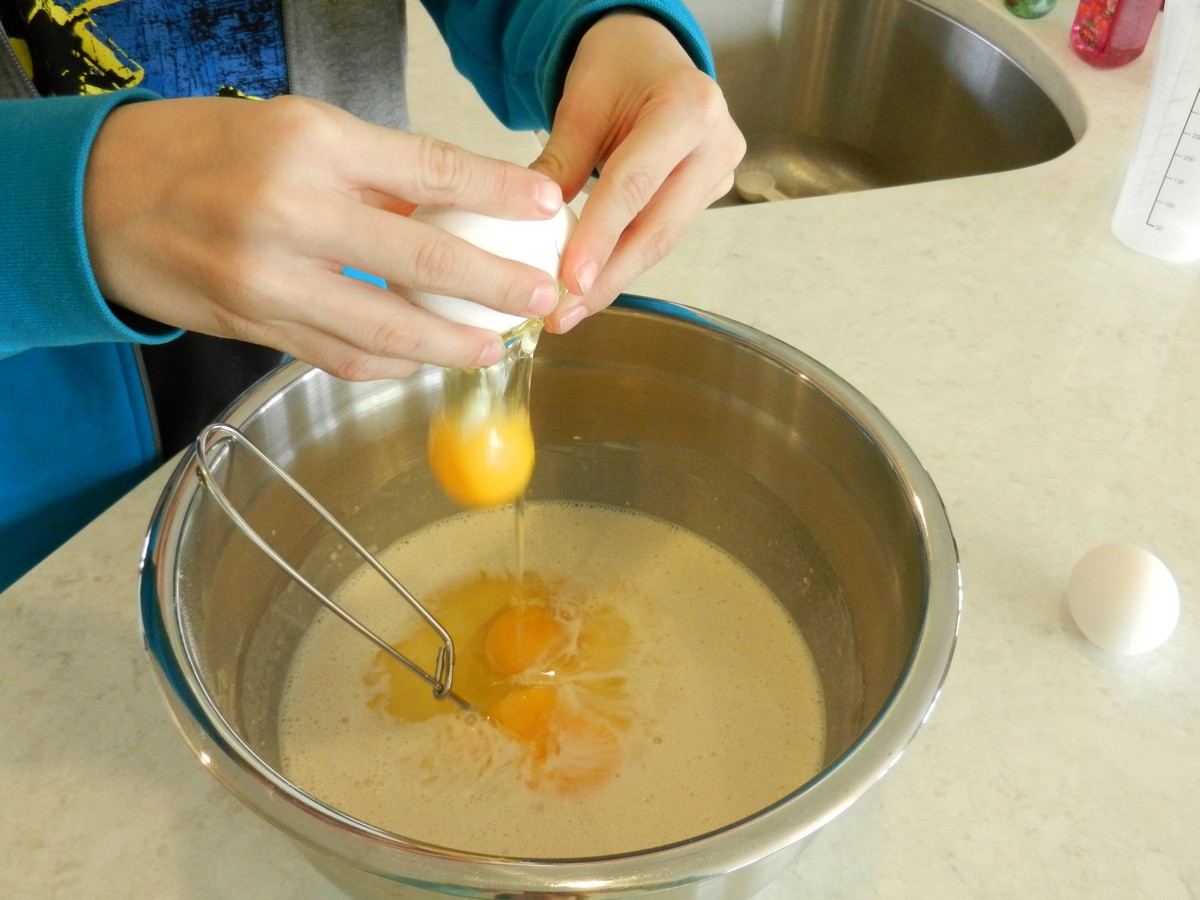 Making Norwegian pancake batter, adding the eggs