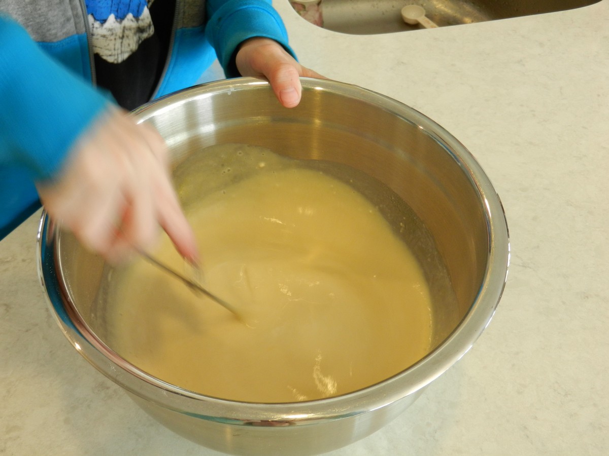 Making Norwegian pancake batter, mixing in eggs