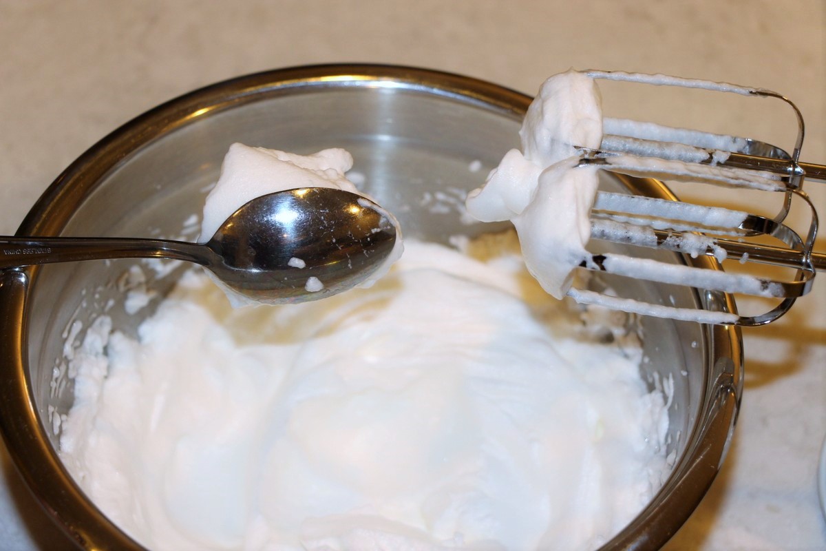 Whipping egg whites until stiff.