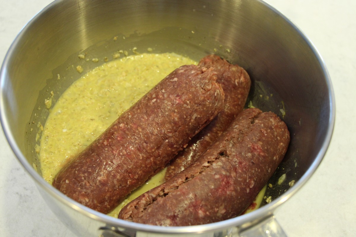 Mixing ingredients for Grandma's old fashioned meatloaf recipe