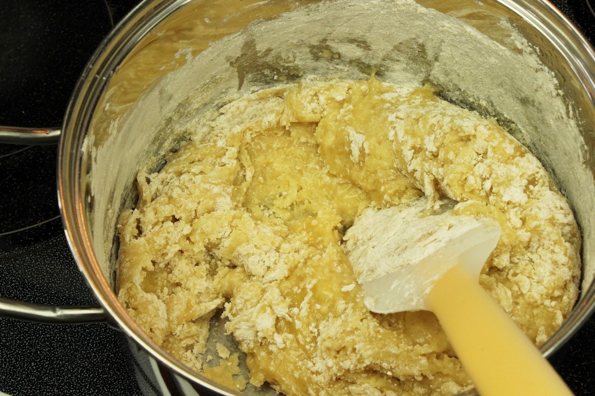 Mixing in flour to sugar cookie batter.