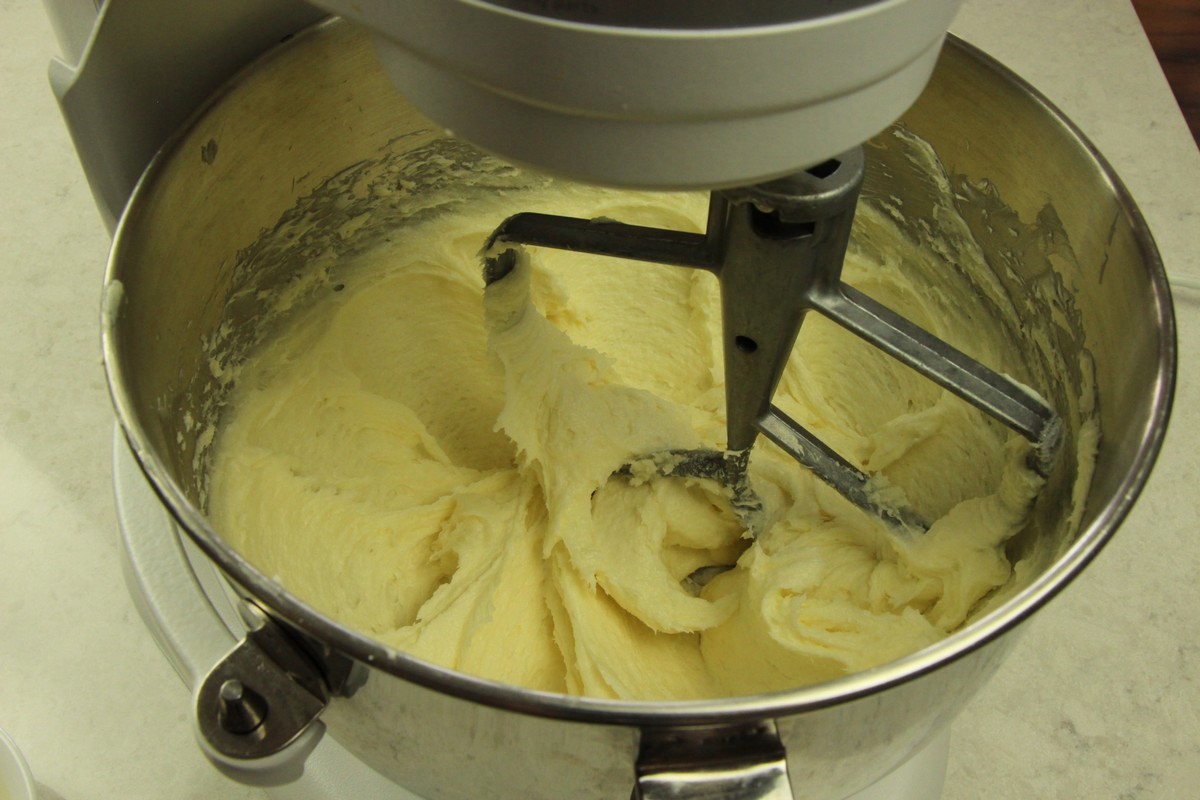 Mixing sugar cookie batter, with cream cheese.