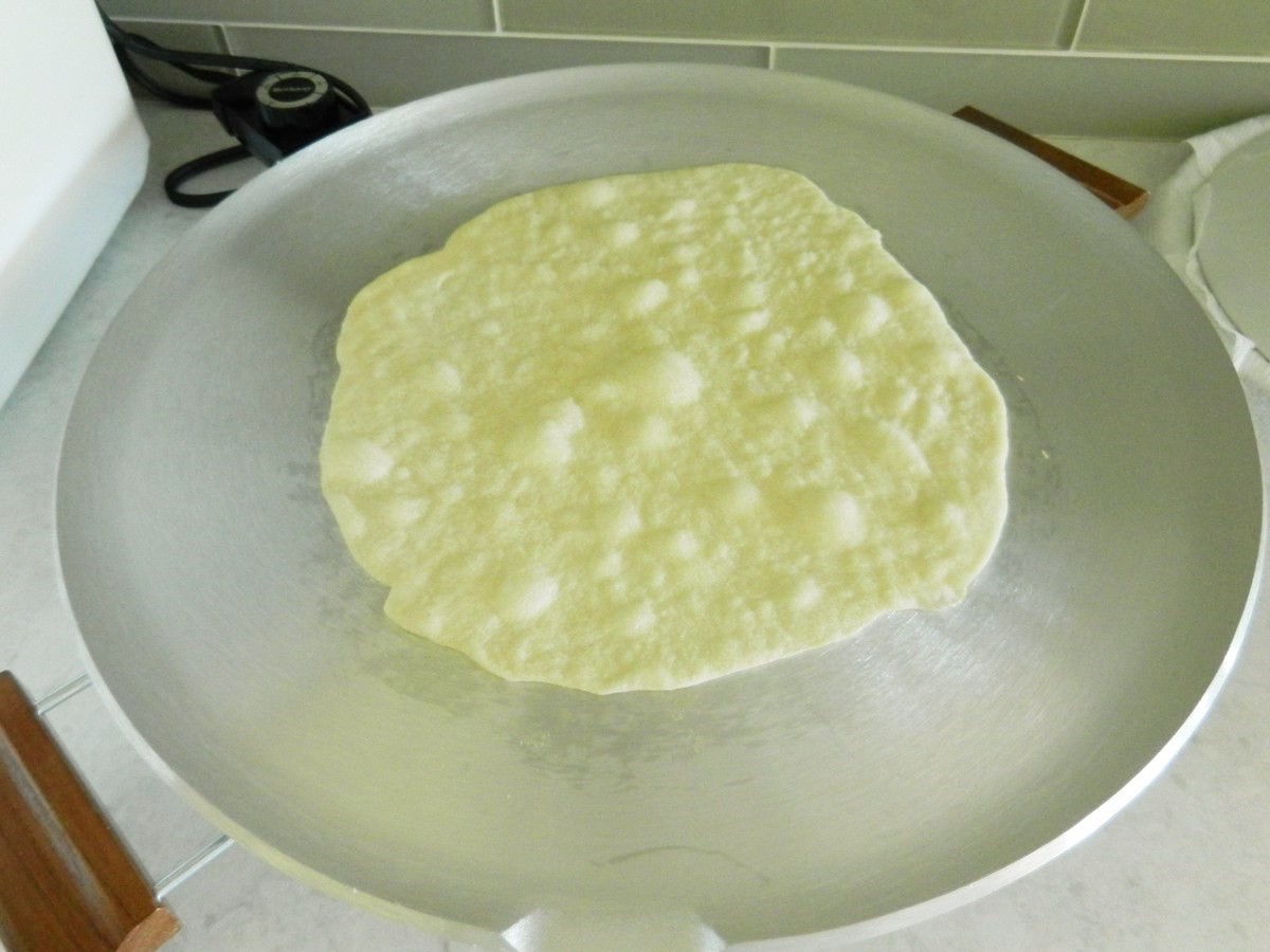 Frying soft, homemade flour tortillas; picture recipe.