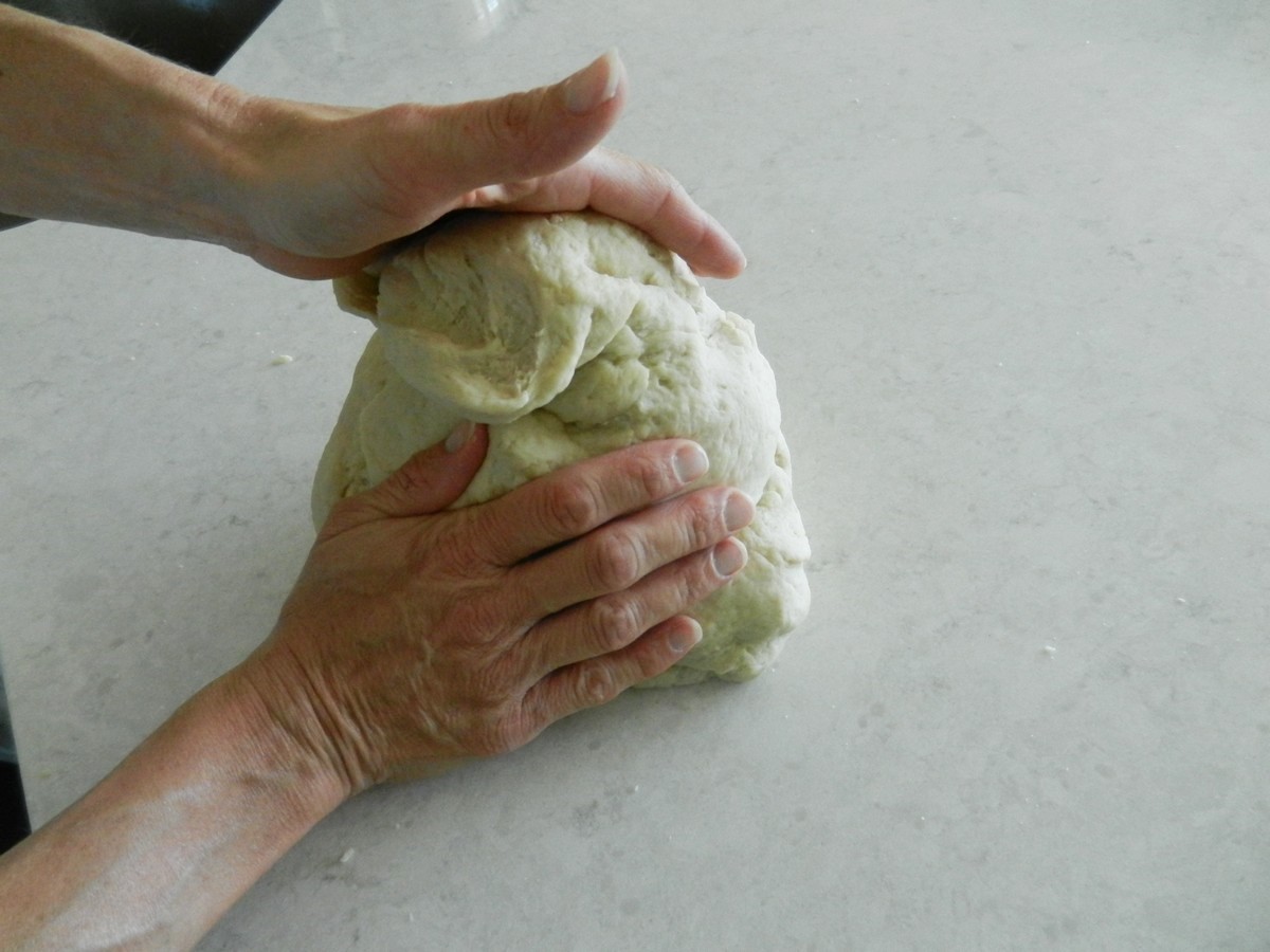 Kneading dough to make soft, flavorful flour tortillas. Recipe and pictures.