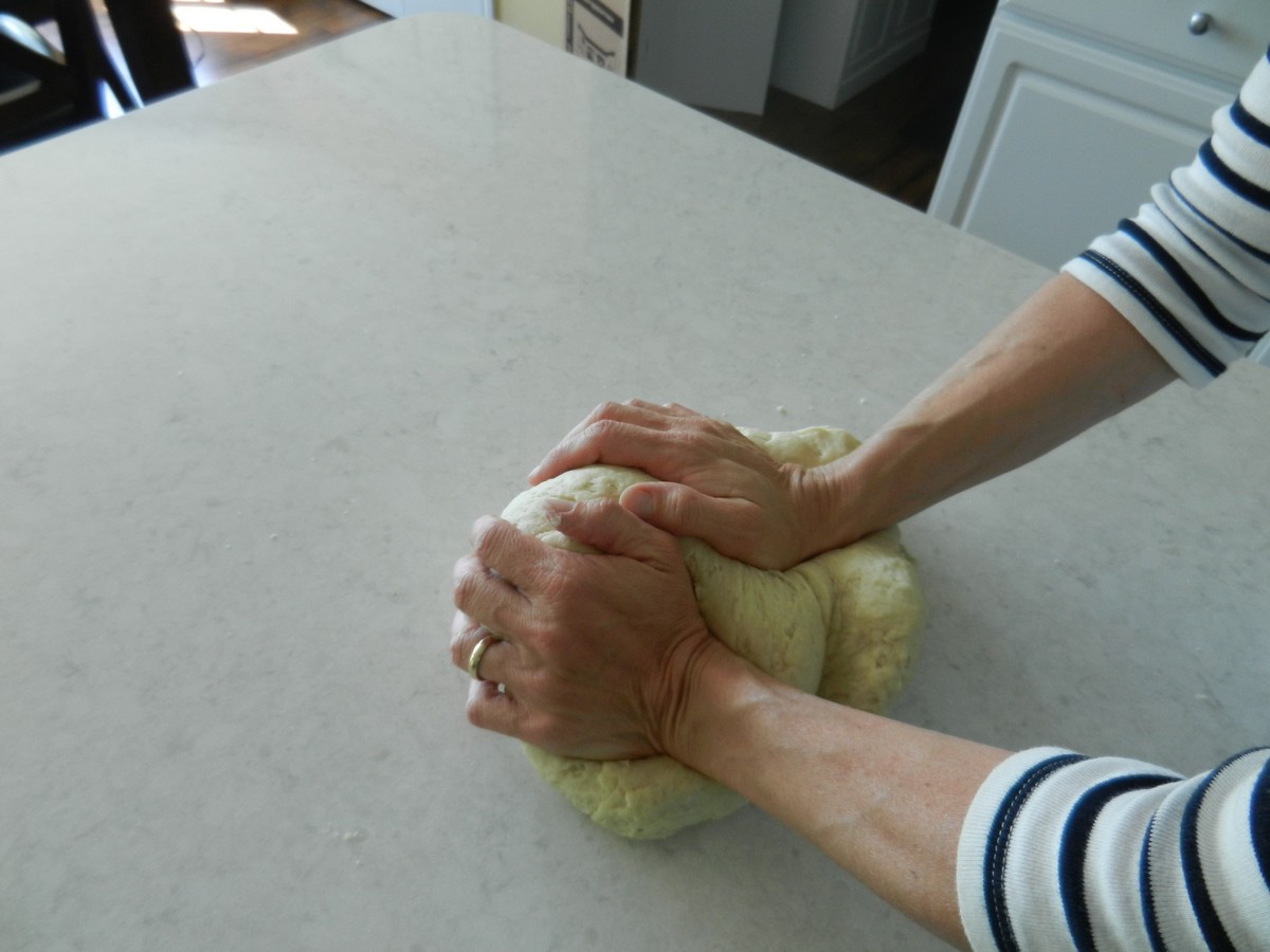 Kneading dough to make soft, flavorful flour tortillas. Recipe plus pictures.