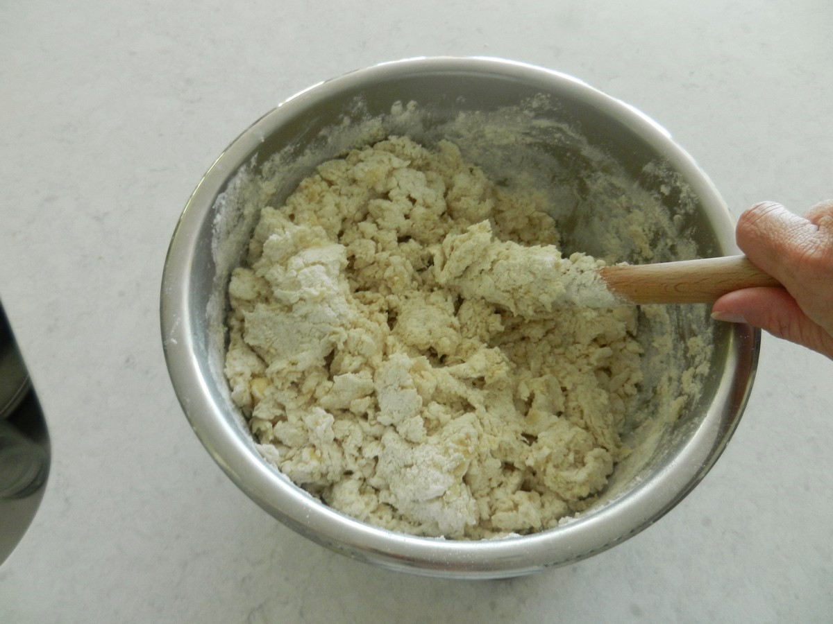 Stirring flour mixture with hot water. Making soft, flavorful flour tortillas. Recipe plus pictures.