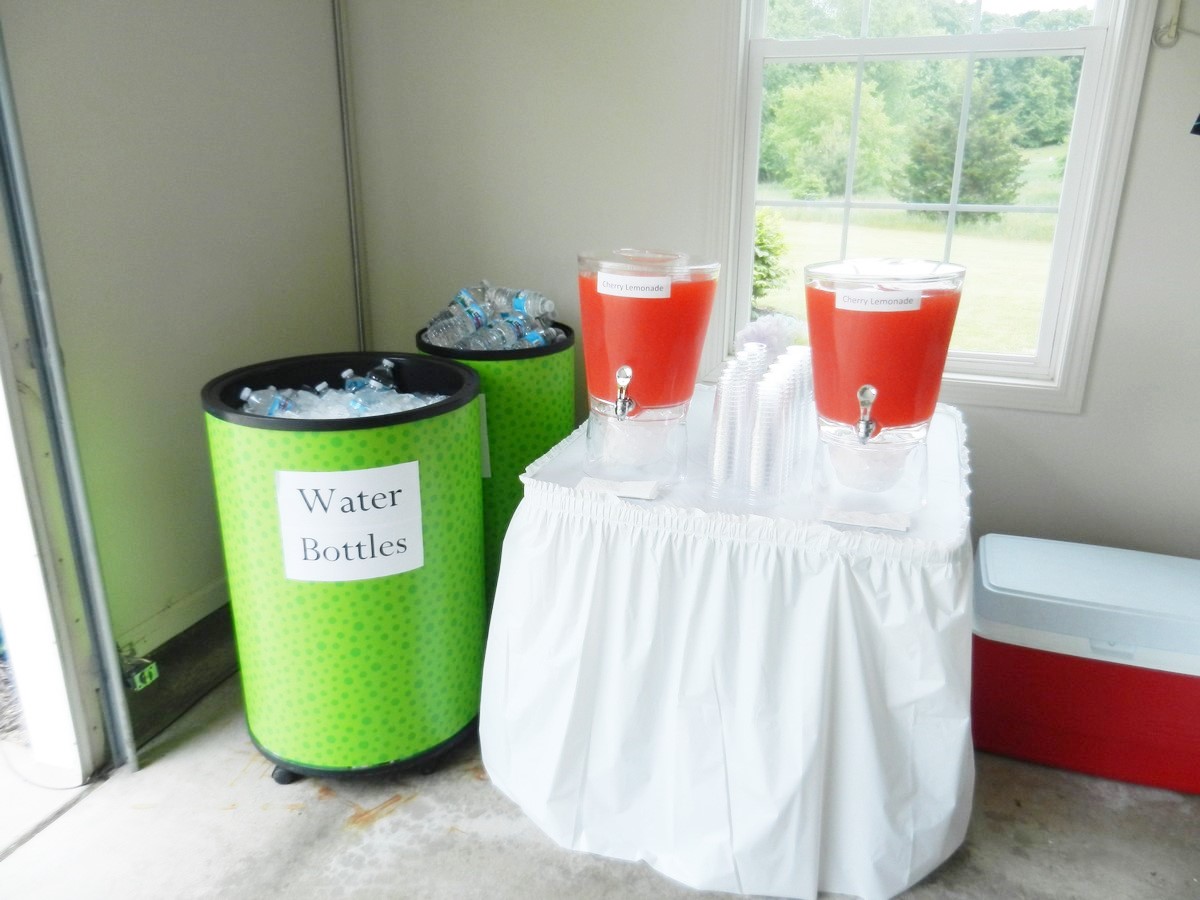 How to make fantastic, flavored lemonade while cutting cost for a crowd; beautiful cherry and other flavors. Recipe.